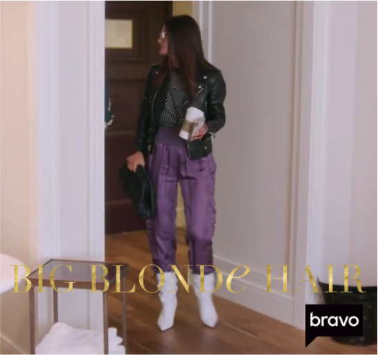 Lisa Barlow’s Leather Jacket, Striped Top, Black Bag and Purple Pants