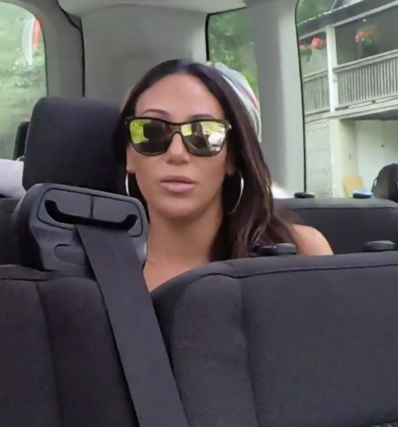 Melissa Gorga’s Black and Gold Mirrored Shield Sunglasses