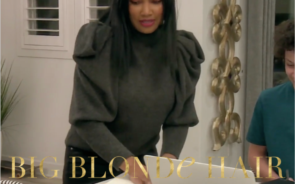 Garcelle Beauvais’ Grey Puff Sleeve Turtleneck