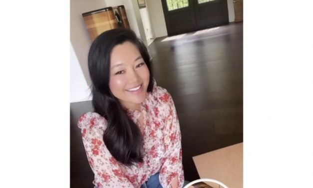 Crystal Kung Minkoff’s Floral Print Ruffle Blouse