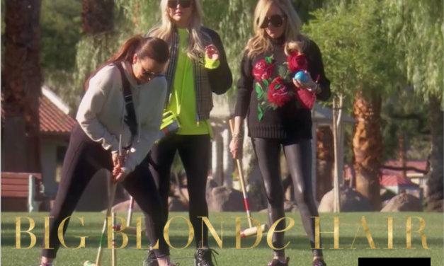 Sutton Stracke’s Black Rose Print Sweater