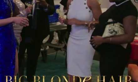 Eboni K. Williams’ White Button Detail Dress