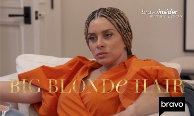 Robyn Dixon’s Orange Puff Sleeve Wrap Top