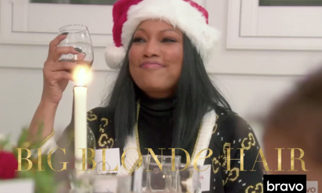 Garcelle Beauvais’ Black and Gold Logo Cardigan