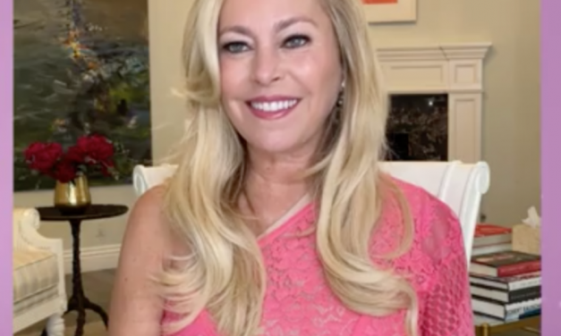 Sutton Stracke’s Pink One Sleeve Lace Dress