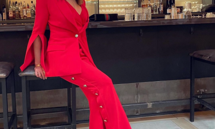 Meredith Marks’ Red Button Detail Suit
