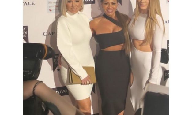 Margaret Josephs’ White Turtleneck Dress
