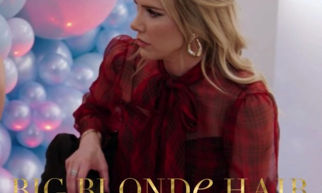 Angie Harrington’s Red Plaid Blouse