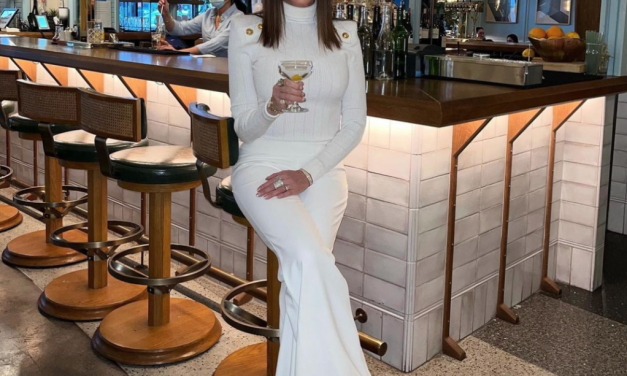 Meredith Marks’ White Button Detail Turtleneck