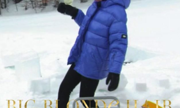 Amanda Batula’s Shiny Blue Puffer Coat