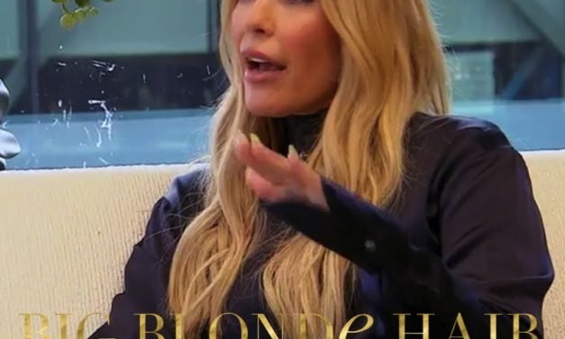 Tracy Tutor’s Navy Satin Crop Top and Belt Bag