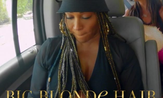 Cynthia Bailey’s Black Bucket Hat and Fanny Pack