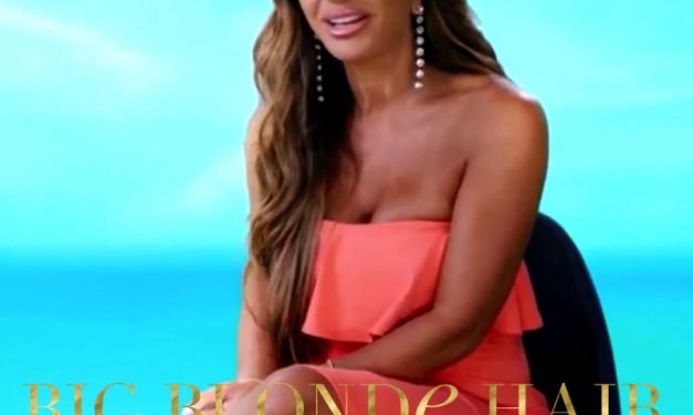 Teresa Giudice’s Coral Ruffle Confessional Dress