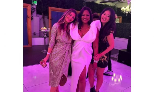 Crystal Kung Minkoff’s Black and Gold Sequin Star Dress