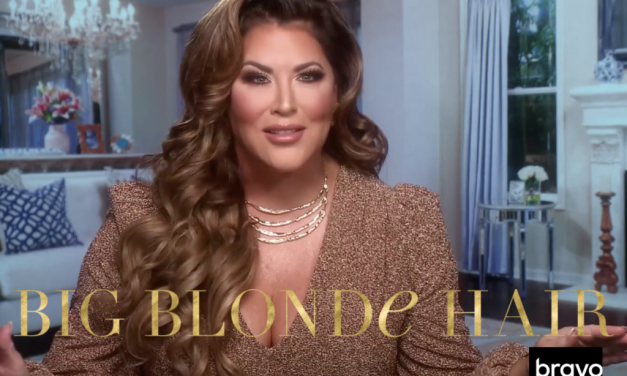 Emily Simpson’s Gold Puff Sleeve Confessional Look