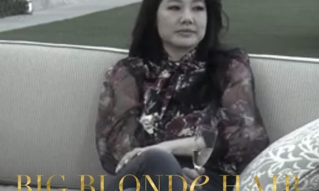 Crystal Kung Minkoff’s Black Floral Blouse