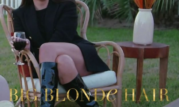 Paige DeSorbo’s Black Patent Boots