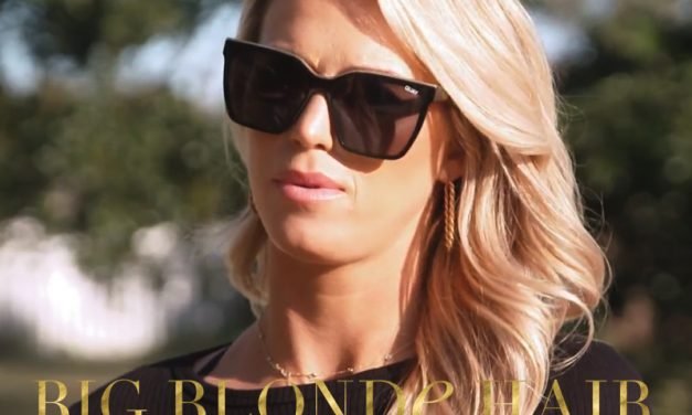 Olivia Flowers’ Black and Gold Sunglasses