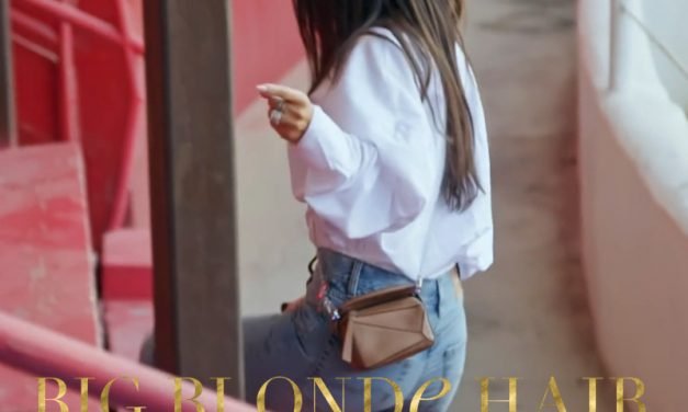 Lisa Barlow’s Tan Mini Crossbody Bag