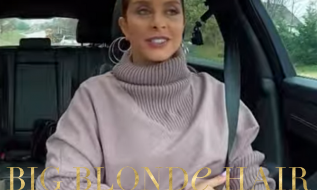 Robyn Dixon’s Purple Turtleneck Sweatshirt