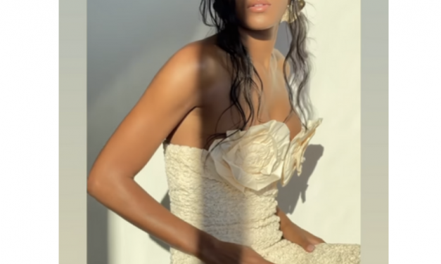 Ciara Miller’s Cream Ruffle Rose Dress