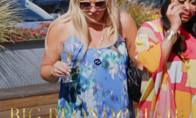 Heather Gay’s Square Chain Sunglasses and Watercolor Cover Up