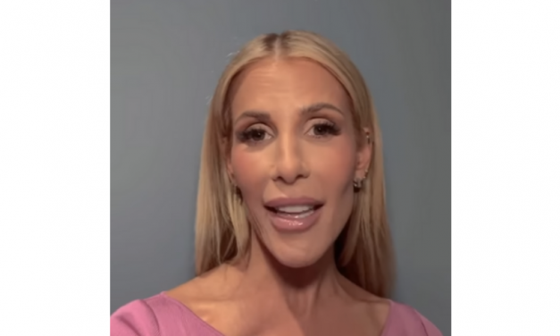 Tracy Tutor’s Pink Lace Up Dress