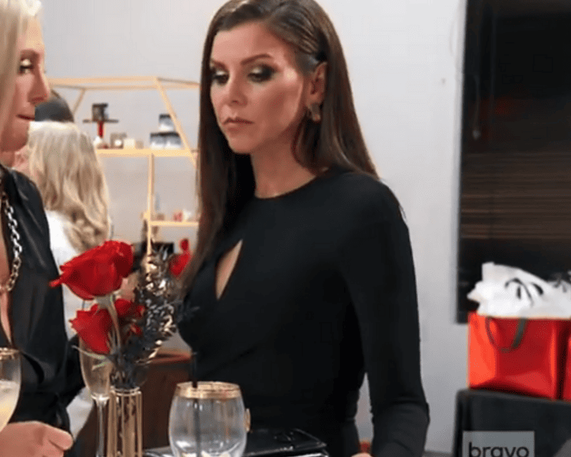 Heather Dubrow’s Black Cutout Belted Dress