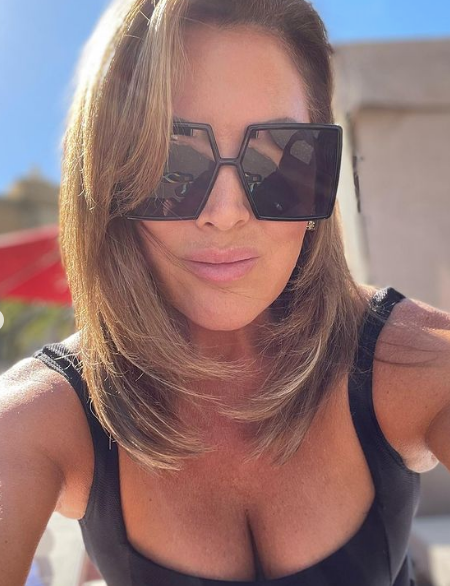 Emily Simpson’s Black Oversized Square Sunglasses