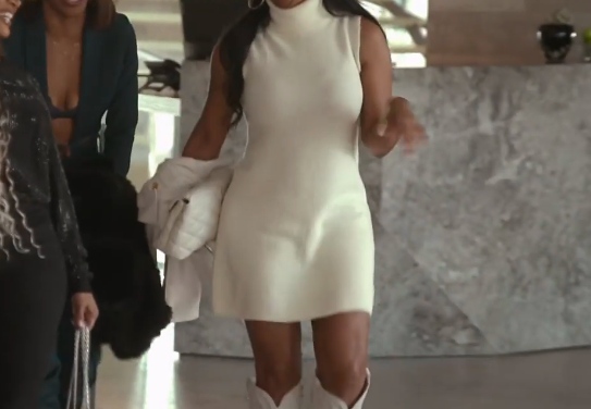 Kenya Moore’s White Cowboy Boots and Turtleneck Dress
