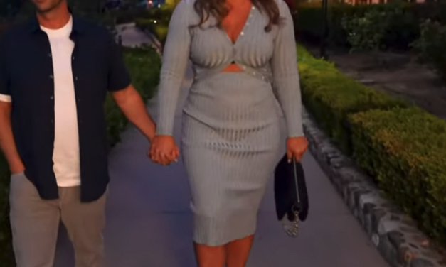 Emily Simpson’s Blue Cutout Cardigan Dress