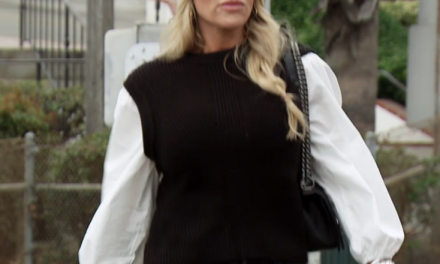 Jennifer Pedranti’s Black Sweater With White Sleeves