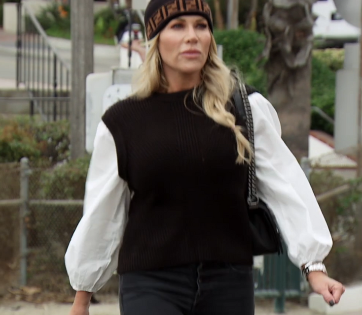 Jennifer Pedranti’s Black Sweater With White Sleeves