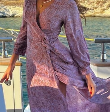 Brynn Whitfield’s Purple Floral Coverup Dress