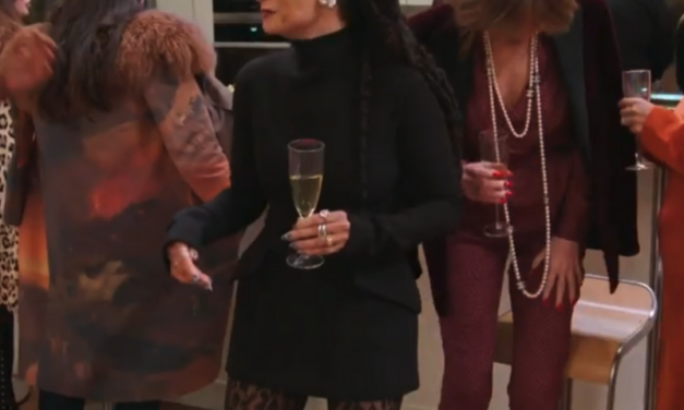 Sai de Silva’s Black Turtleneck Mini Dress