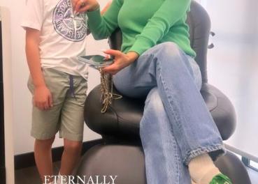 Dorit Kemsley’s Green Sweater and Sneakers
