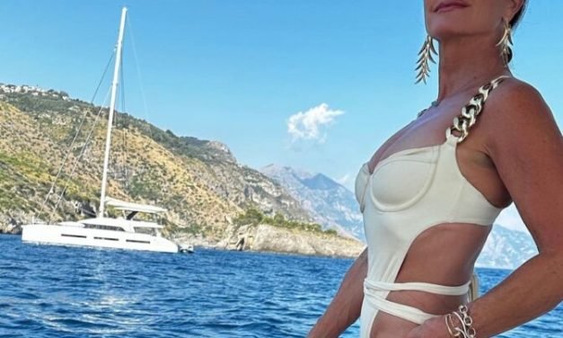 Kyle Richards’ Chain Strap Swimsuit and Netted Cover Up