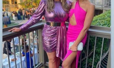 Emily Simpson’s Pink Metallic Draped Dress