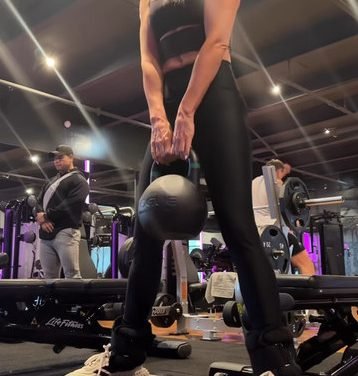 Tracy Tutor’s Black Cutout Tank Top