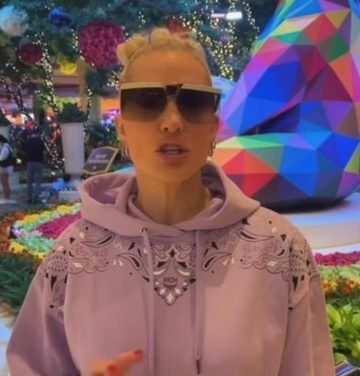 Erika Jayne’s Lavender Bandana Print Sweatshirt