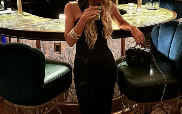 Tracy Tutor’s Black Hooded Top