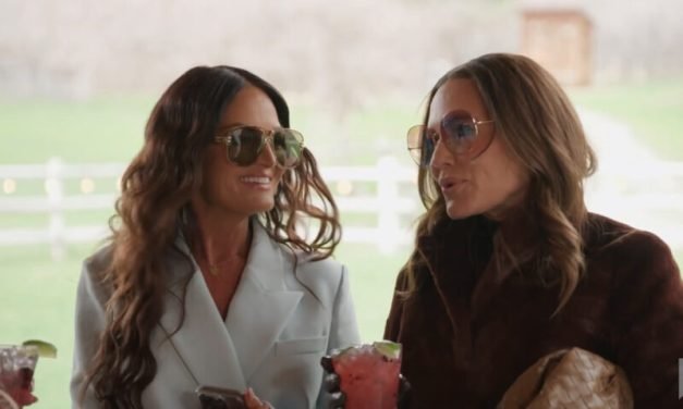 Whitney Rose’s Black Gucci Shirt and Pilot Sunglasses