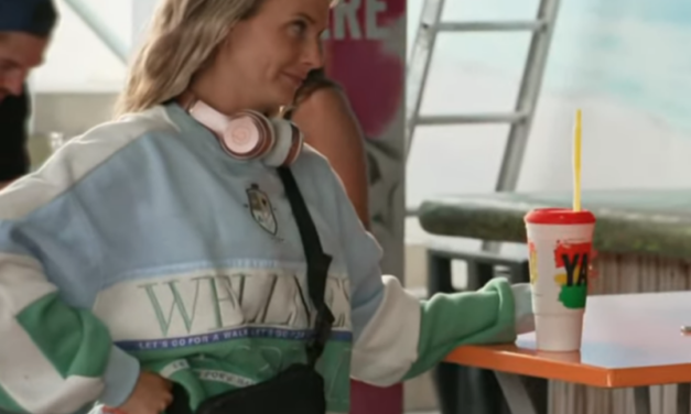 Paige DeSorbo’s Blue and Green Sweatshirt