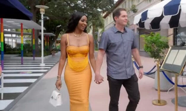 Guerdy Abraira’s Orange Fringe Midi Dress