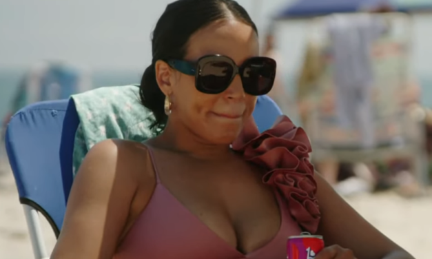 Danielle Olivera’s Pink Ruffle One Piece Swimsuit