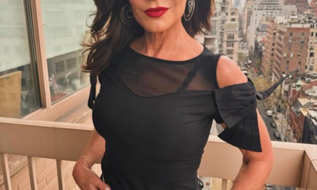 Luann de Lesseps’ Black Cold Shoulder Bow Top