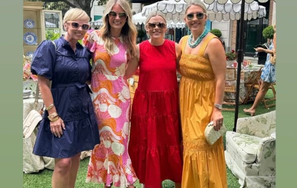 Cameran Eubanks’ Pink and Orange Printed Midi Dress