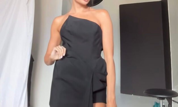 Paige DeSorbo’s Black Draped Asymmetric Dress