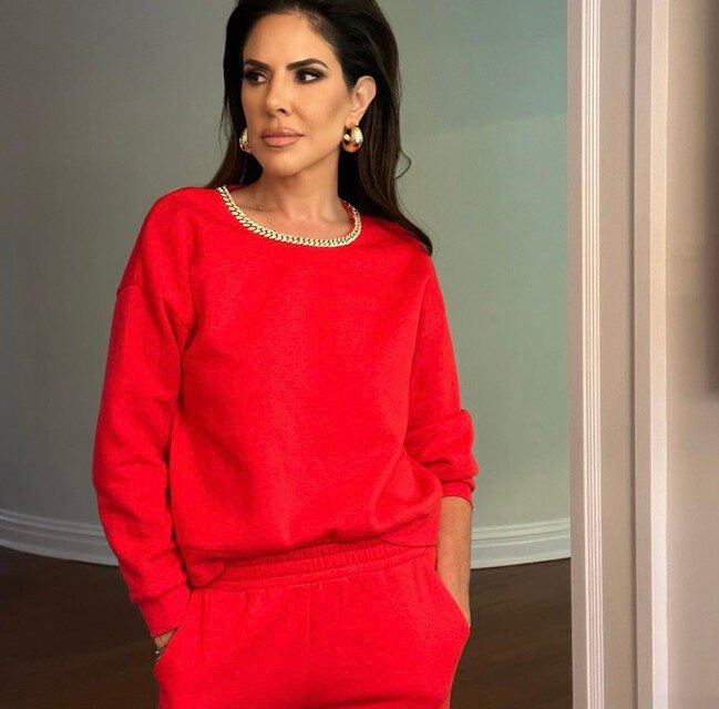 Jenn Fessler’s Red Chain Embellished Sweatshirt