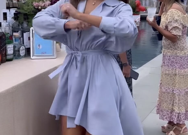 Brynn Whitfield’s Blue Asymmetric Shirt Dress